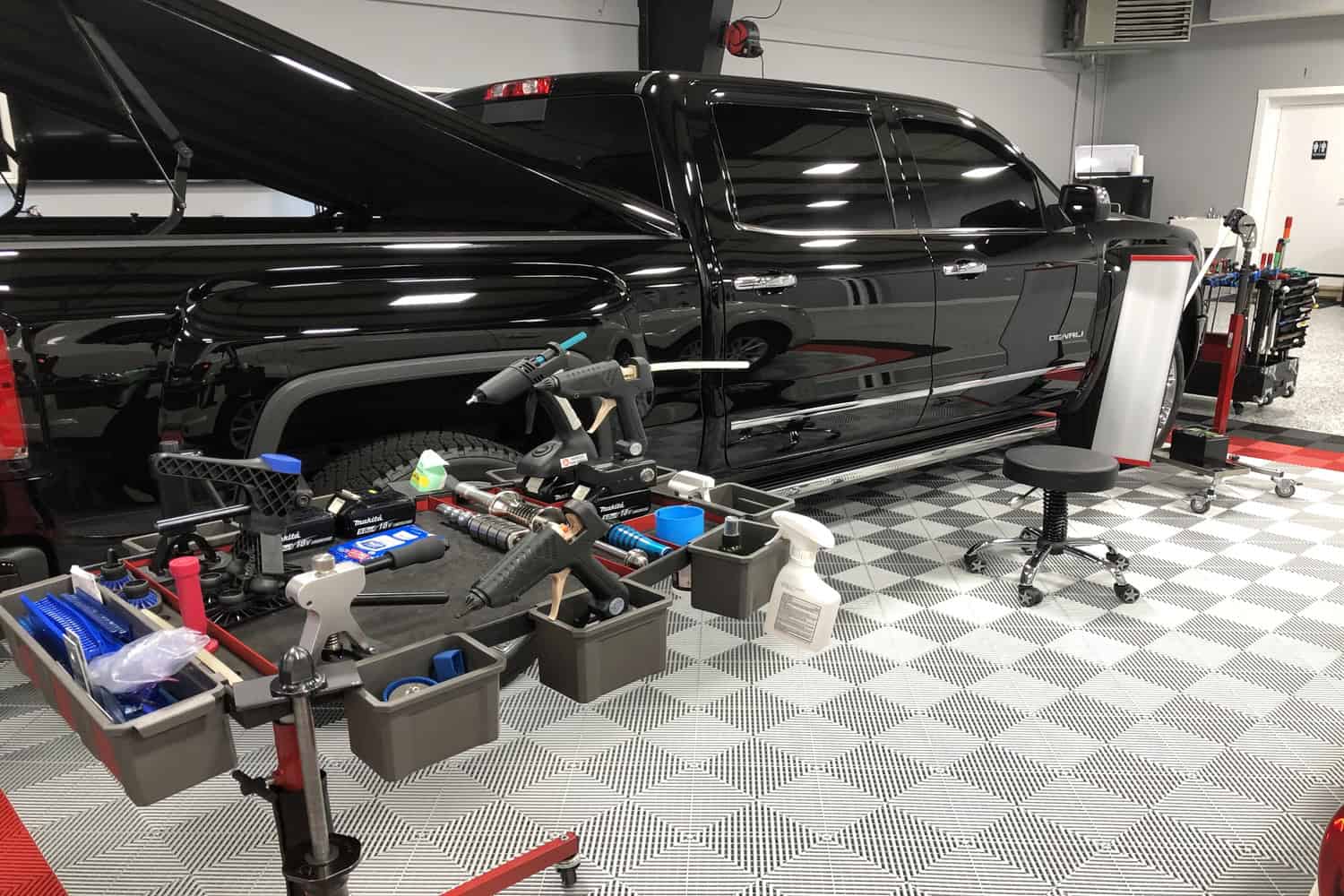 Auto dent removal service being performed by ARC Certified Master Technician at RPM Dent Repair in Raynham, Massachusetts