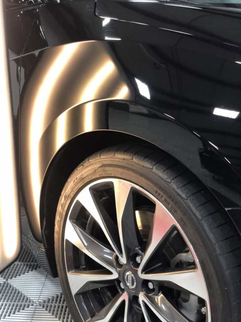 Black Car Lower Panel PDR Assessment — Raynham MA Black car lower body panel and wheel area PDR assessment at RPM Dent Repair Raynham Massachusetts
