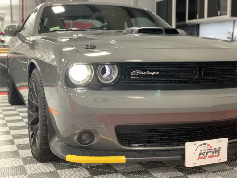 Dodge Challenger PDR Work — RPM Dent Repair Raynham MA Silver Dodge Challenger at RPM Dent Repair shop for paintless dent repair in Raynham Massachusetts