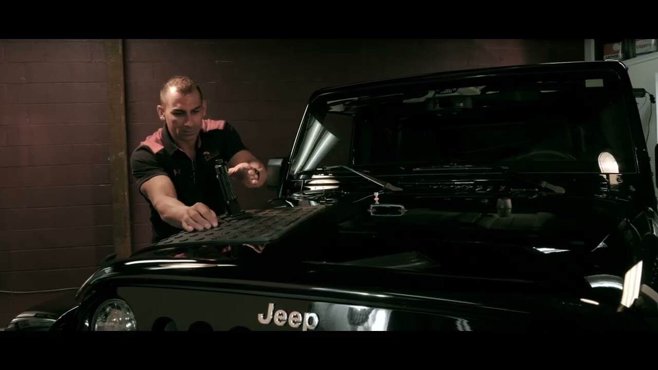 PDR video thumbnail showing door ding removal with specialized tools